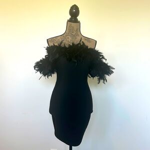 Feather cocktail mini dress .
